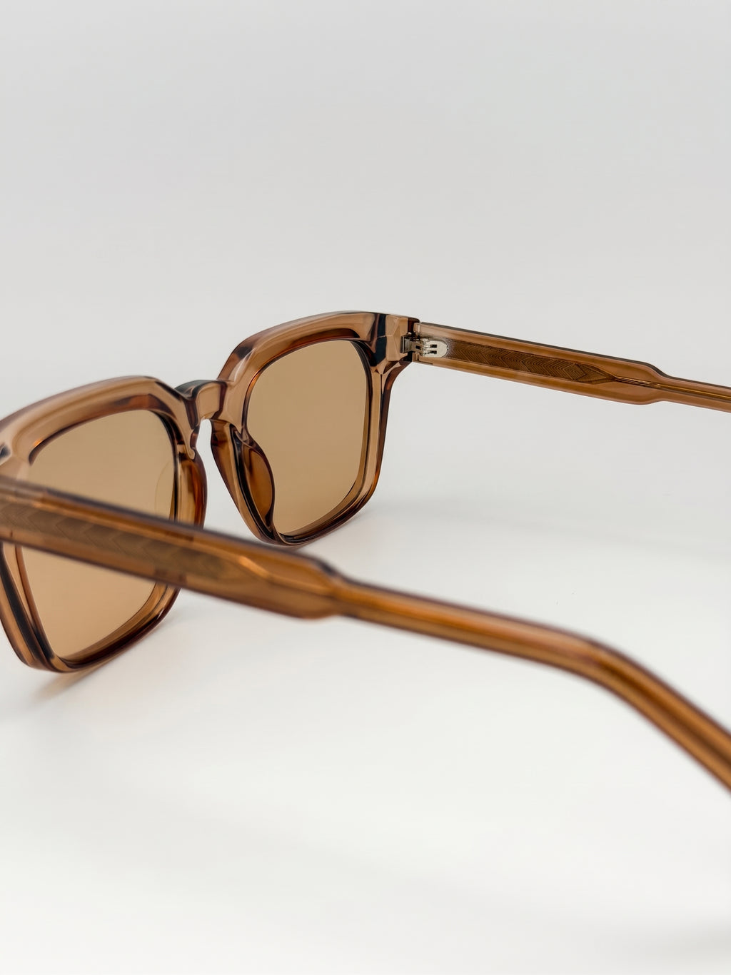 SOLENE SQUARE FRAME – TRANSLUCENT AMBER TINTED LENS